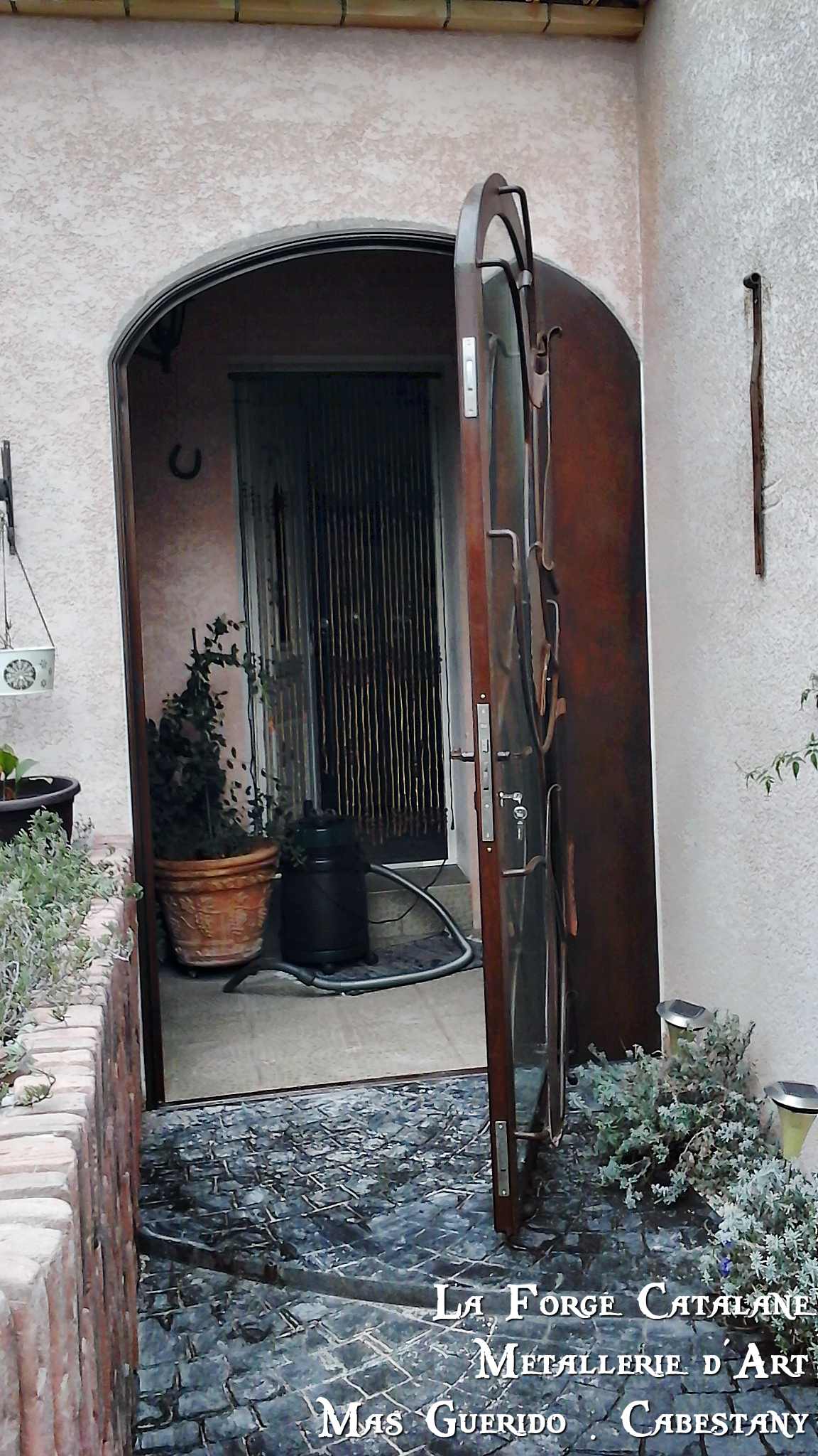 porte entree vitree rondin decoupe laser La Forge Catalane Cabestany (2).jpg